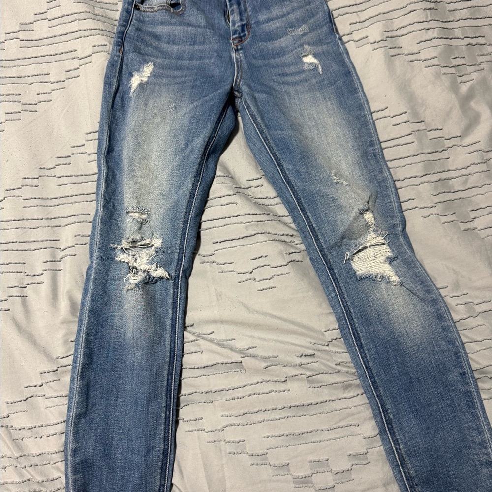 Blue Skinny Jeans with Distressed Details
